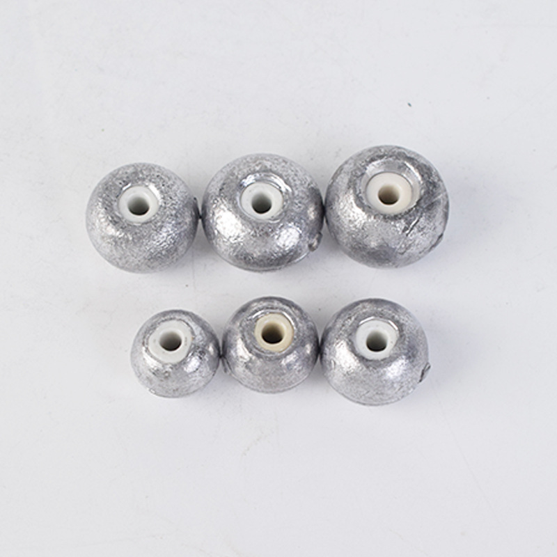 Picture of Factory wholesale fishing gear supplies ceramic abacus bead lead pendant bullet swivel lead pendant heart does not hurt the line lead pendant