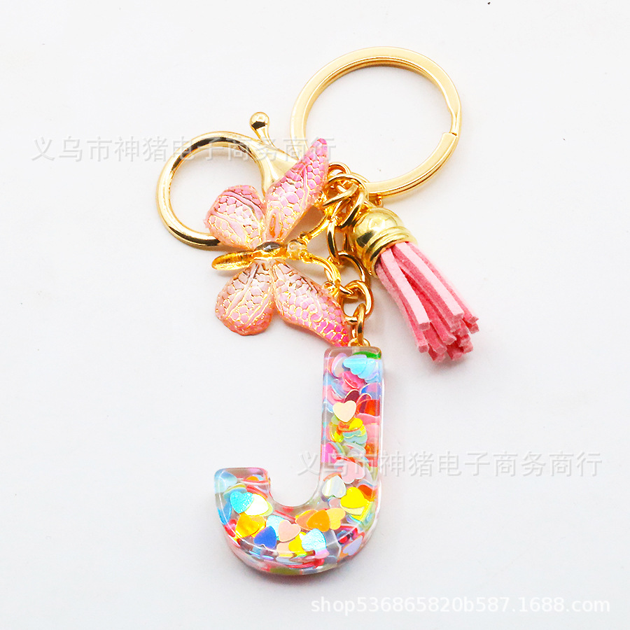 New peach heart keychain pendant manufacturers wholesale in stock letters love pendant pink butterfly tassel