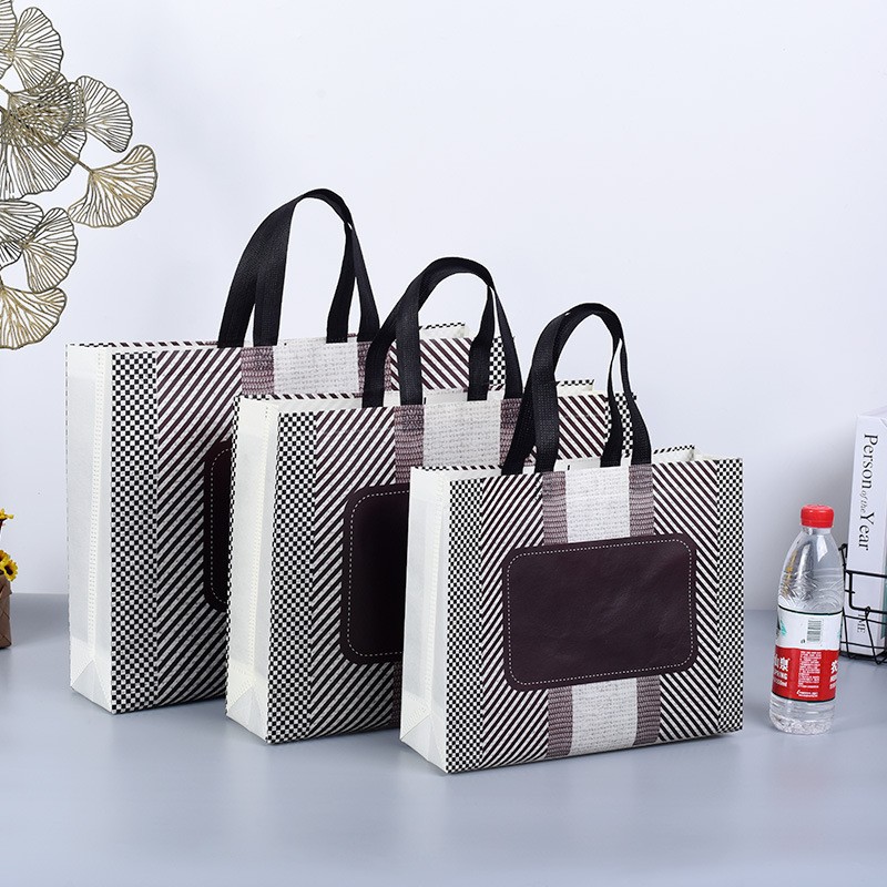 Picture of Non-Woven Handbags, Clothing Store Bags, Custom-Made Boys' and Girls' Clothing Shopping Bags, Coat Gift Bags, Custom-Made