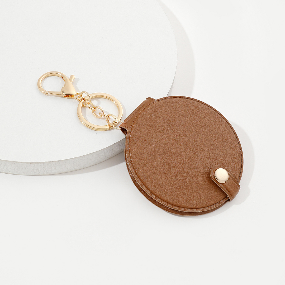 Picture of Creative round makeup mirror keychain pu leather car bag pendant carry-on solid color mini small mirror