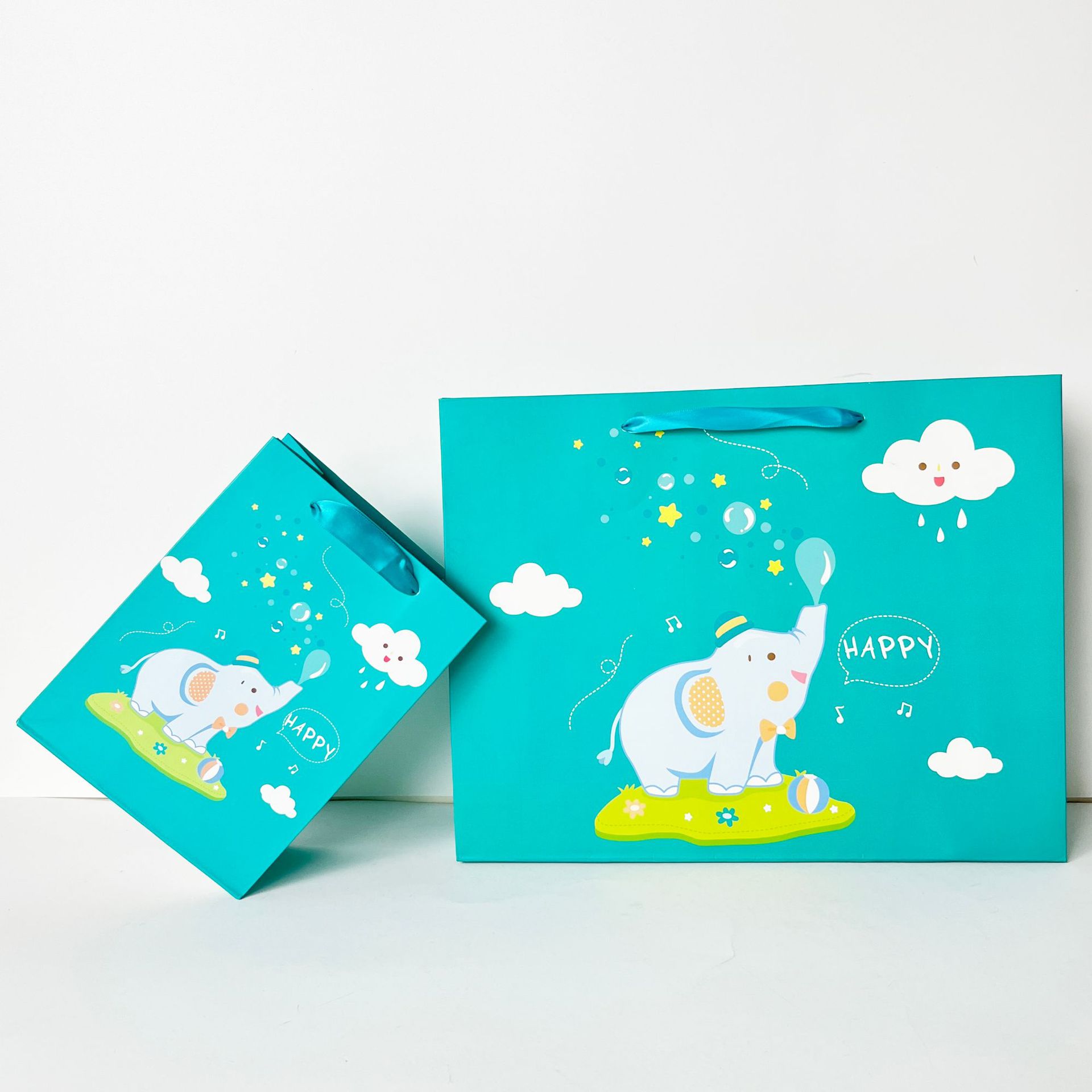 New spot cute cartoon gift paper bag children's clothing store birthday gift bag baby elephant children's clothing tote bag