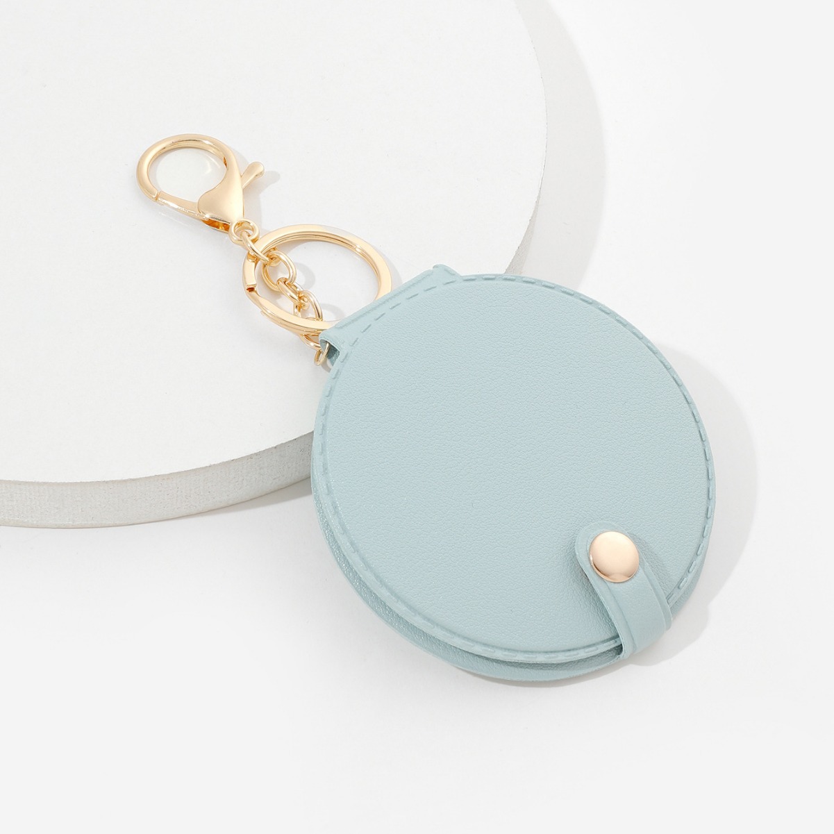 Picture of Creative round makeup mirror keychain pu leather car bag pendant carry-on solid color mini small mirror