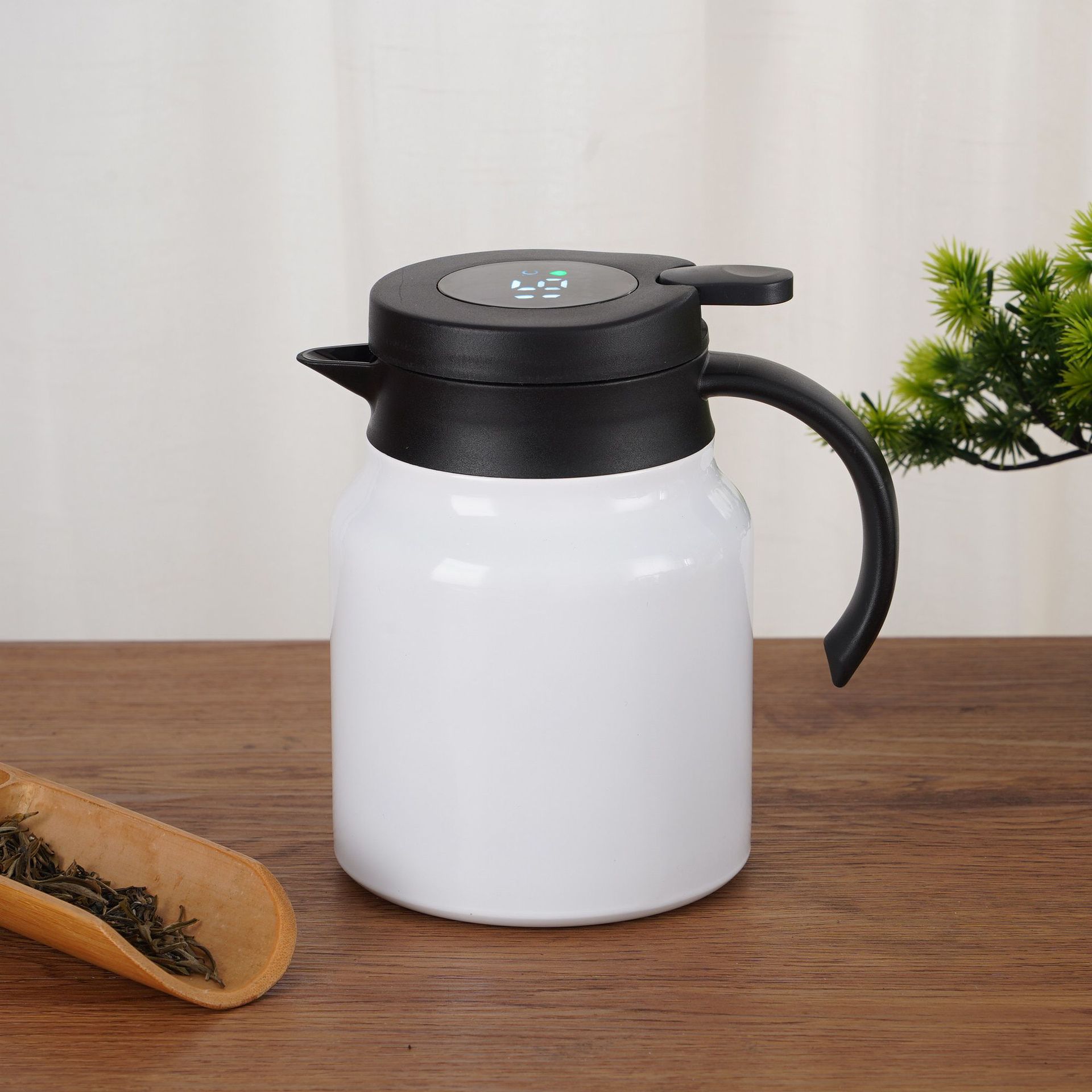 Picture of New super large capacity 316 stainless steel stewed teapot smart household pot handle insulation pot gift pot
