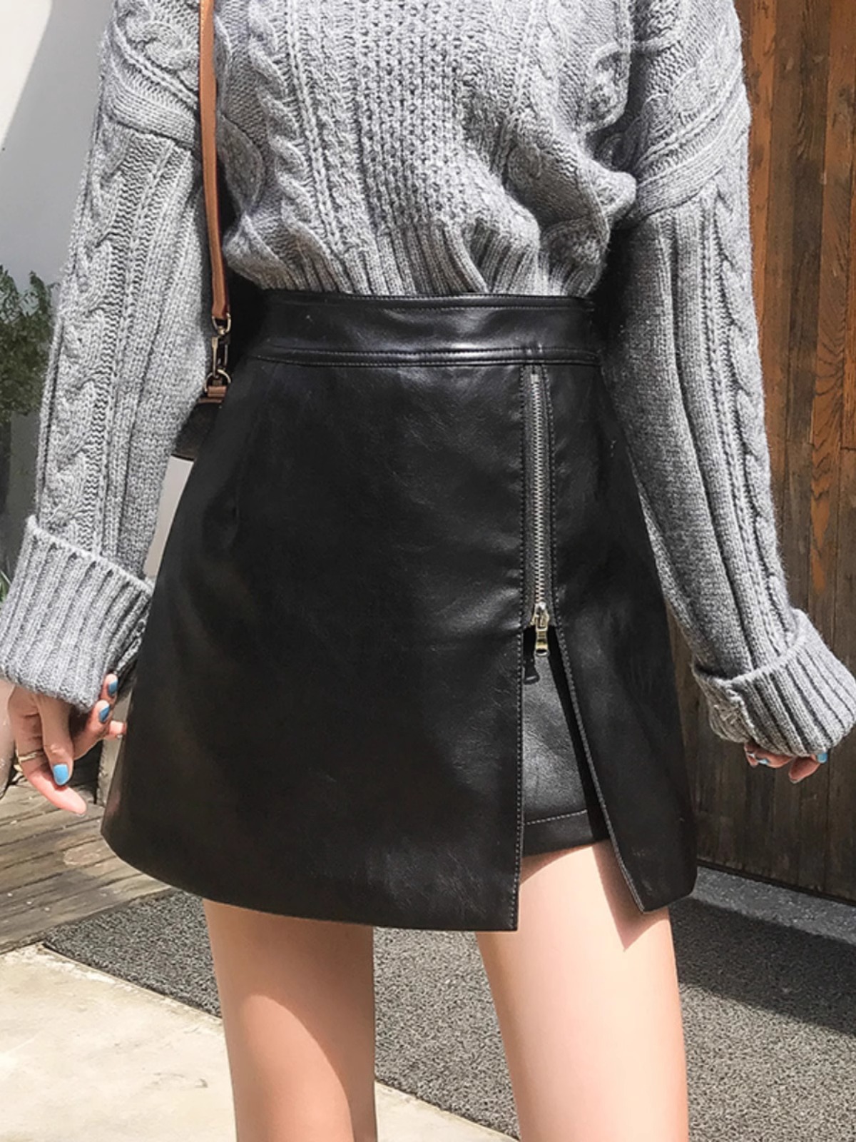 Picture of 2023 Autumn and Winter Elegant PU Leather Skirt Women's High Waist Slimming Irregular Hip Skirt Fashionable Korean A- line Skirt