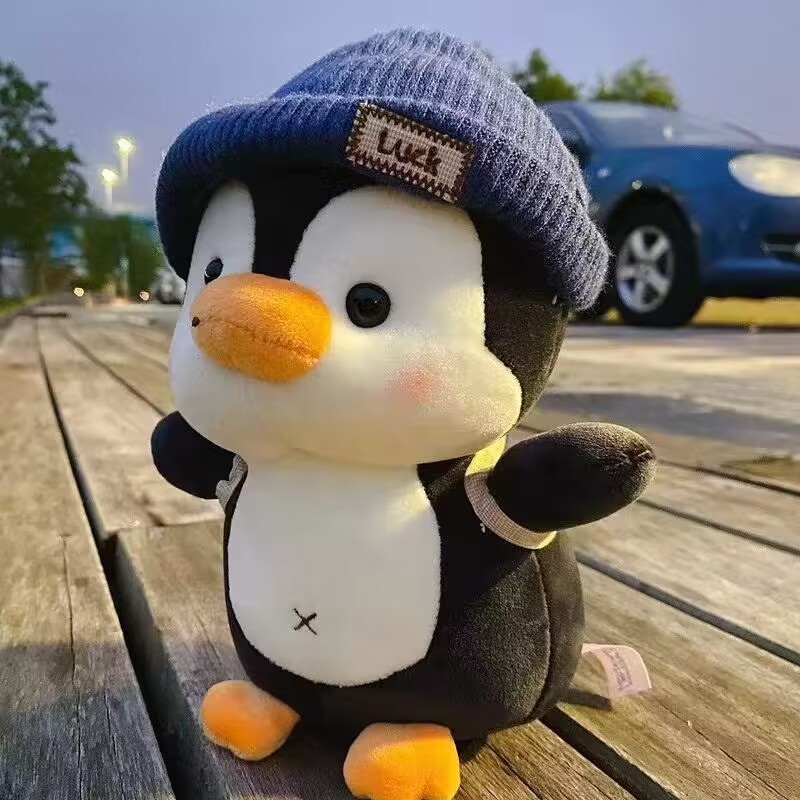 Picture of Backpack travel penguin doll plush toy grab doll doll children's day female birthday gift items wholesale