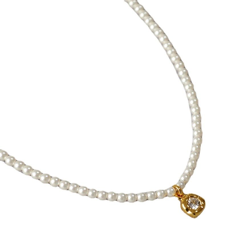 French Elegant Niche Design Imitation Pearl Simple and Delicate Asymmetrical Zircon Flower Pendant Short Necklace