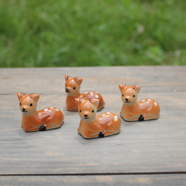 Picture of Ceramic crafts ornaments 12592 deer chopsticks rack sika deer chopsticks rack pen rack factory direct wholesale