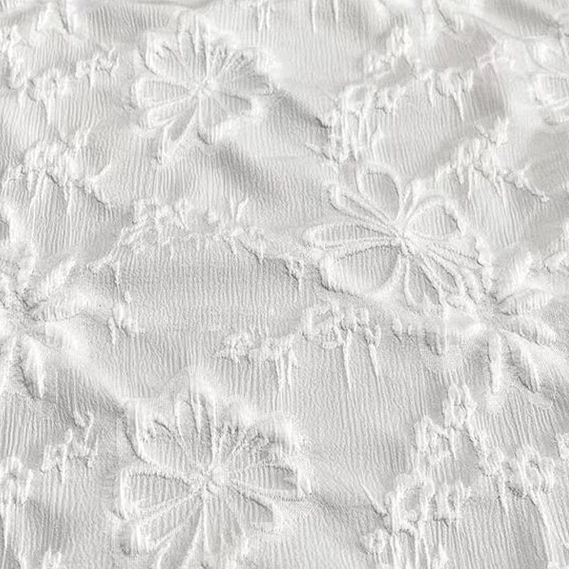 Picture of Floating sunflower four-sided elastic fabric milk white Chinese clothing three-dimensional fabric pleated texture flower jacquard cheongsam manufacturers