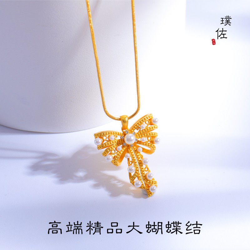 Picture of Long-standing antique gold imitation gold pearl lace large bow pendant necklace sweater chain clavicle chain women