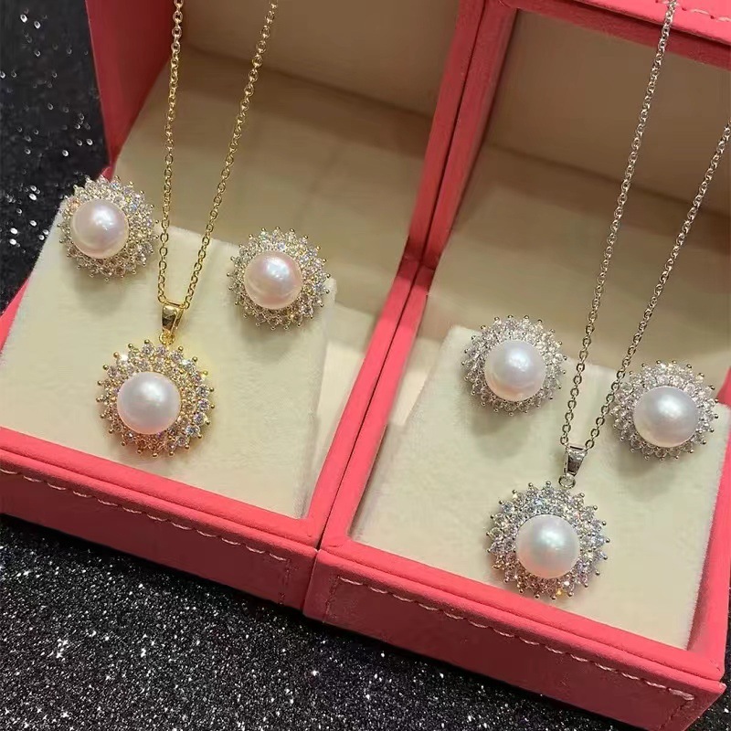 Sun flower pearl necklace women's high-end luxury sweater chain niche clavicle chain earrings ring suit combination