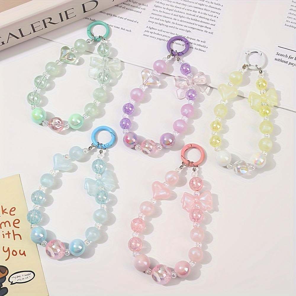 Japanese and Korean fresh beaded mobile phone lanyard new bow key chain anti-lost mobile phone case hanging ornaments female in stock wholesale