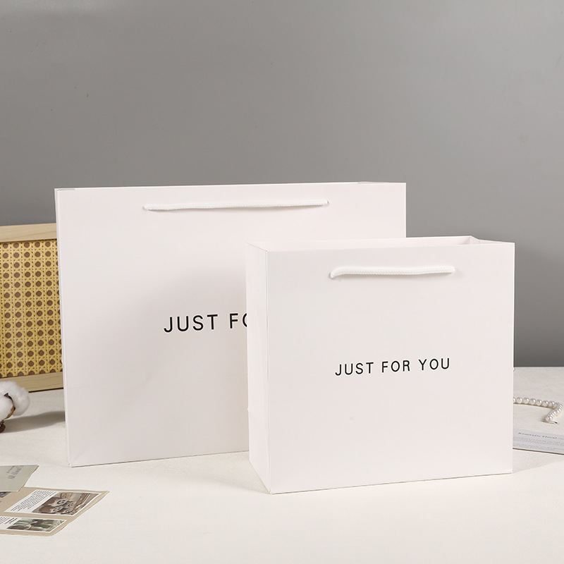 in stock Rectangular Paper Bag Thickened White Card Handbag Clothing Store Handbag Simple White Skin Care Packaging Bag