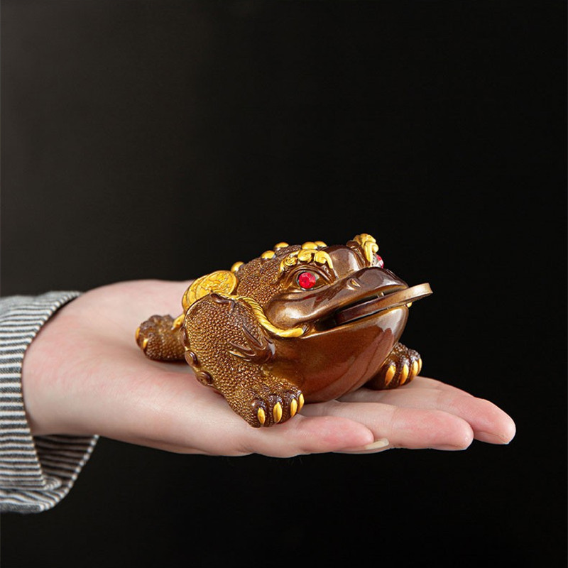 Picture of Crazy with the same money golden toad tea pet color can raise toad personality fruit litchi products tea table tea pet ornaments