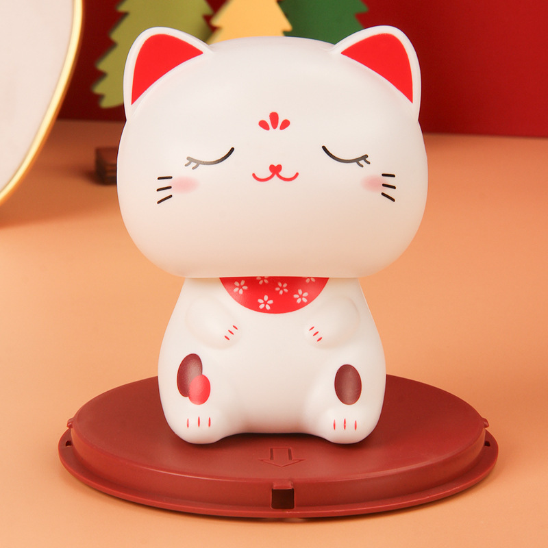 Picture of Solar big head white cat nods lucky cat creative shop opens craft gifts car ornaments cashier