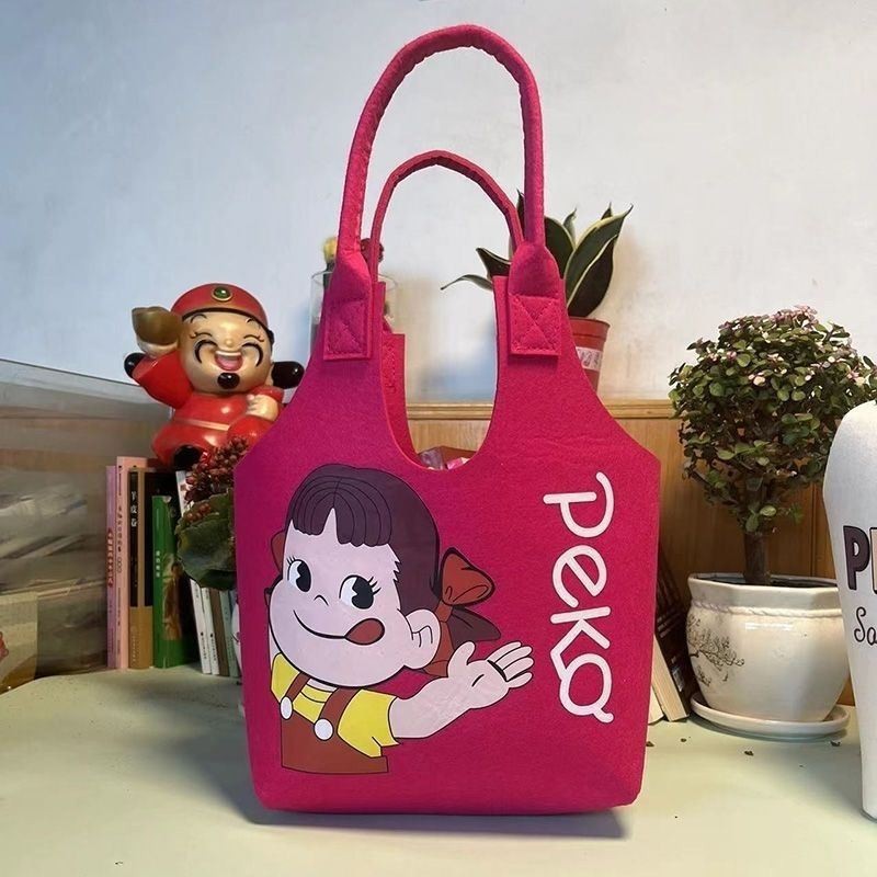 Picture of New Cyber Celebratory Cartoon Student Handbag Super Cute Cartoon Cute Rabbit Felt Bag Full Moon One Year Old Bag Mend-up Bag