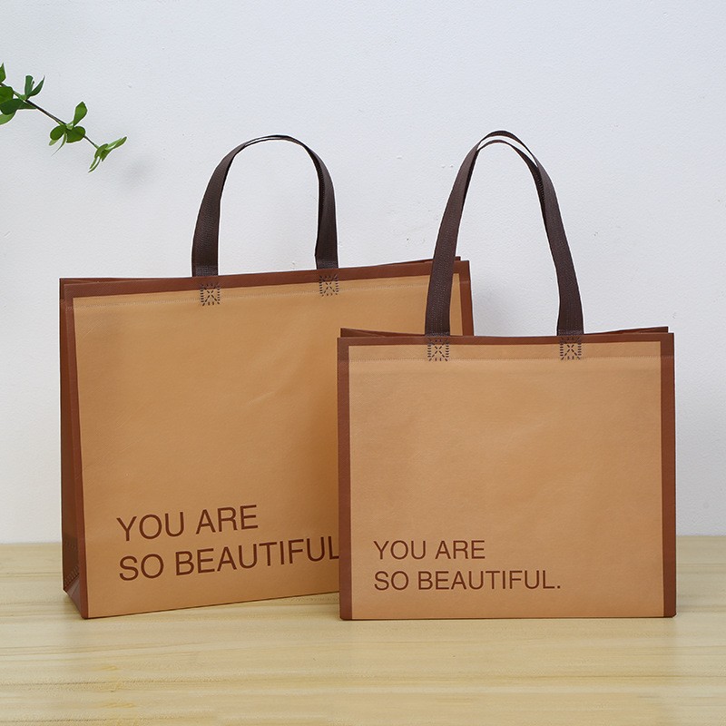 Picture of Non-Woven Handbags, Clothing Store Bags, Custom-Made Boys' and Girls' Clothing Shopping Bags, Coat Gift Bags, Custom-Made