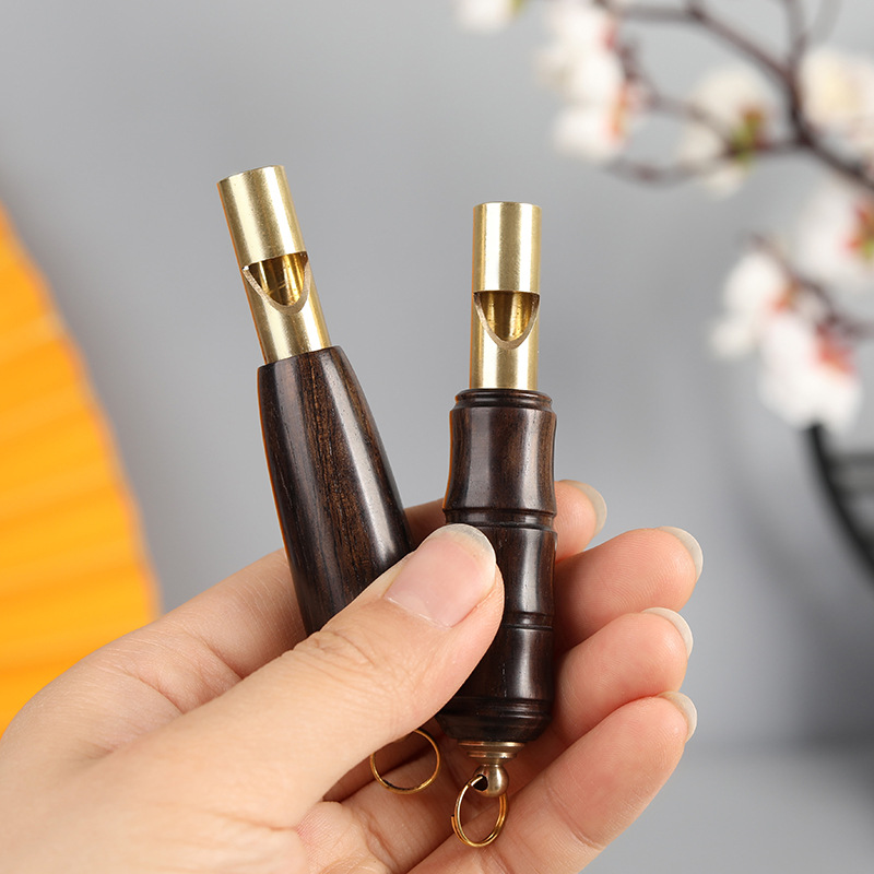Picture of Brass Red Sandalwood Outdoor Lifesaving Whistle Keychain Pendant Competition Tall Whistle Mountaineering Training Pendant