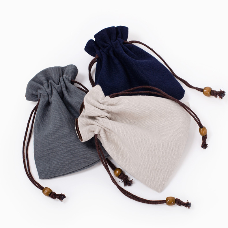 Factory wholesale blank spot double flannel cotton and linen bundle pocket can be printed logo text play beaded drawstring storage bag