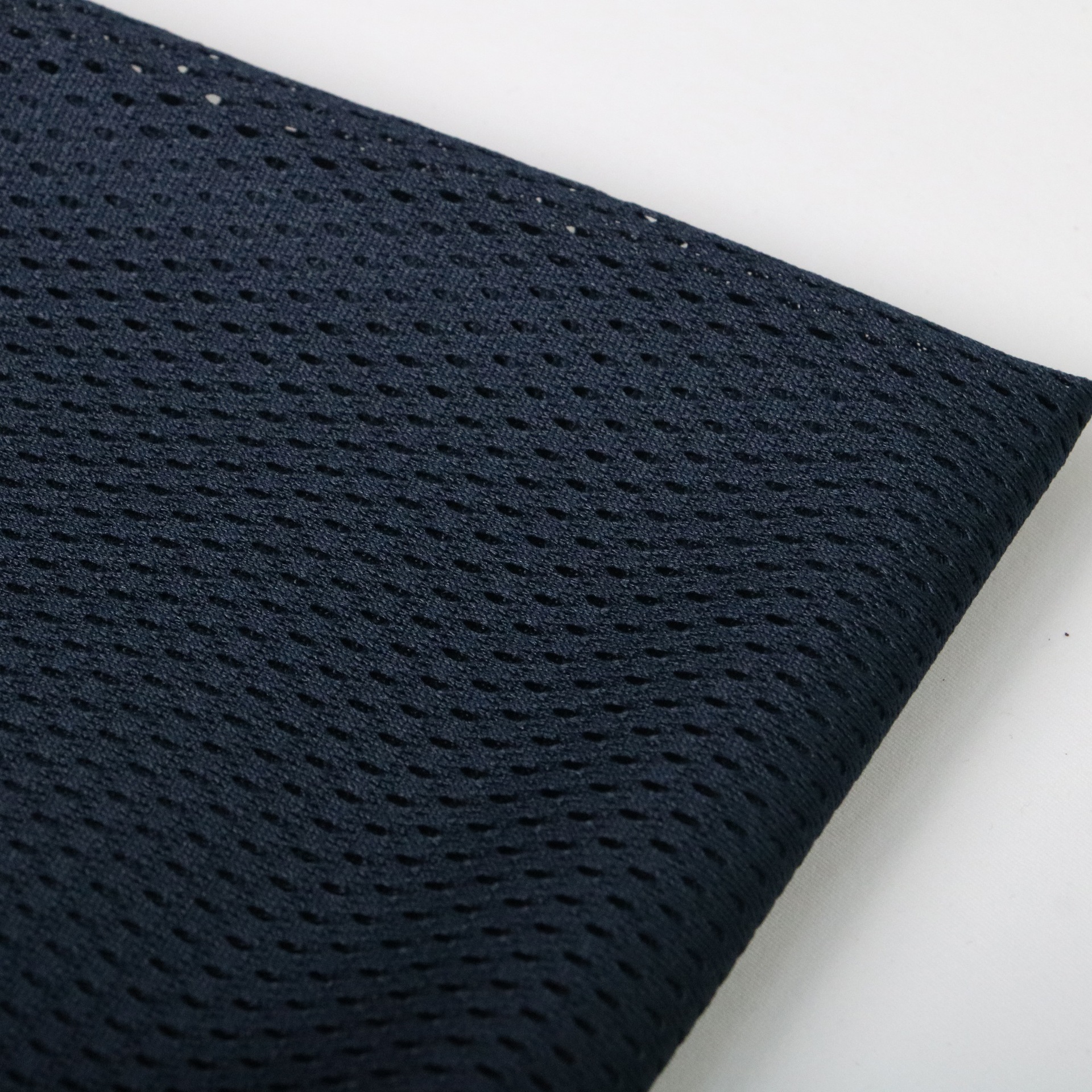 Picture of in stock Polyester Warp Knitted Low Elastic Bullet Hole Triangle Cloth Peach Mesh Breathable Moisture-wicking Sportswear Lining