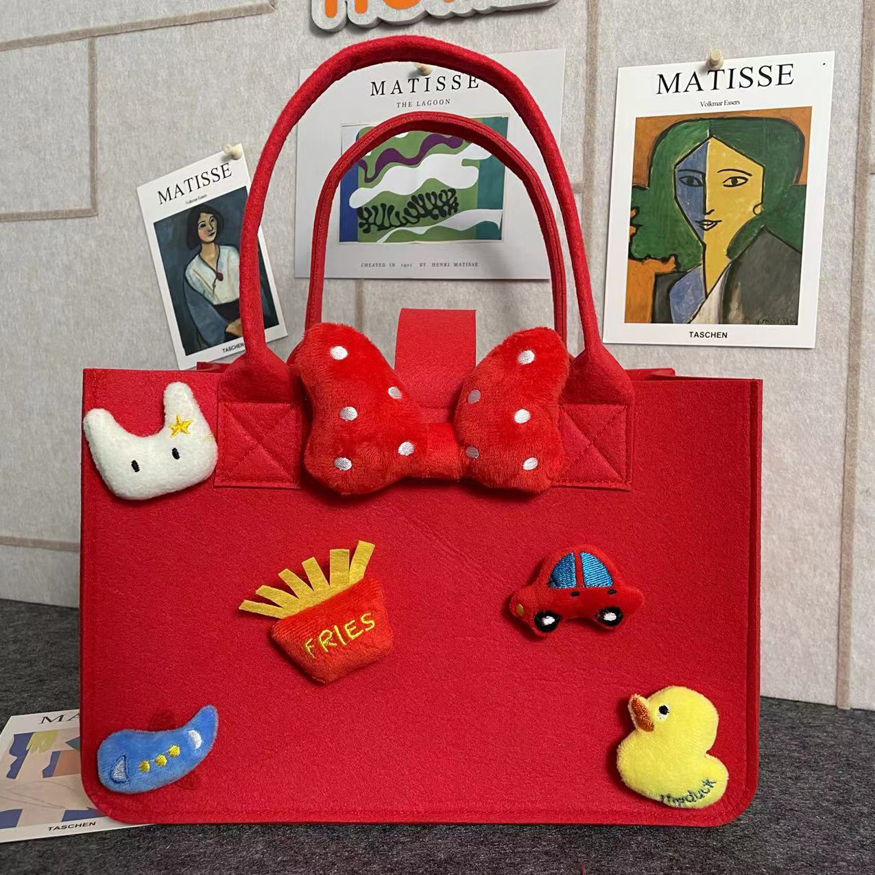 Picture of Felt Bag Custom Accompanying Gift Cartoon Felt Handbag One-year-old Hundred-day Banquet Handmade Felt Handbag Gift Bag