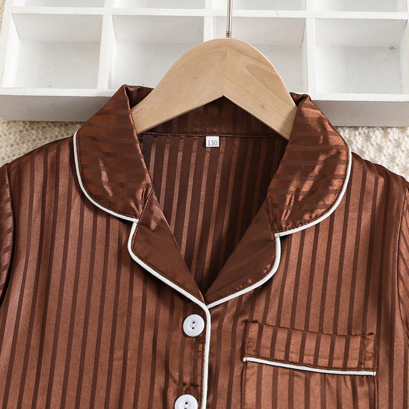 Picture of Spring and Summer Children's Silk-like Pajamas Short-sleeved Pants Suit Middle and Large Children's Home Clothes Boys' Cardigan Solid Color Home Clothes