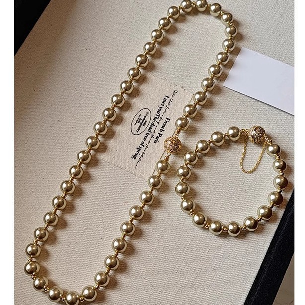 Ball Magnetic Buckle Mocha Golden Brown Shijia Pearl Bracelet Women's Light Luxury Niche Autumn and Winter Elegant Cyber Celebrity Clavicle Chain