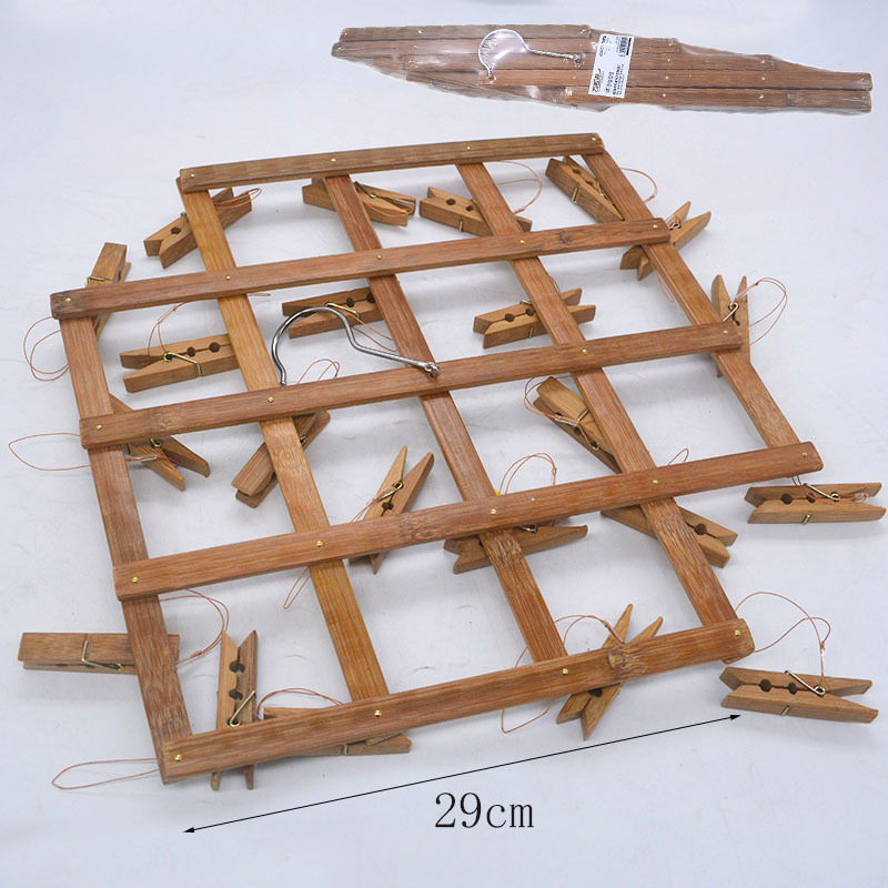 Picture of Old-fashioned bamboo pants rack with multi-clip pants clip household seamless hanging pants special bamboo rack retractable hanger drying clip