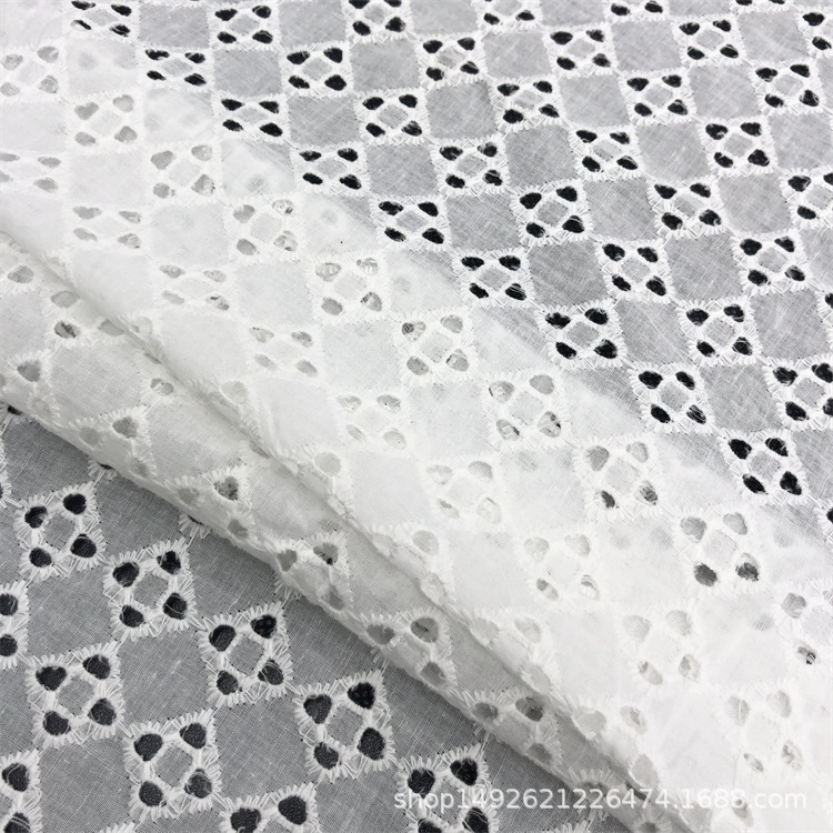 New Hot Selling Cotton Embroidered Fabric Fashion Dress Fabric Large Machine Embroidered Cotton Hollow Fabric