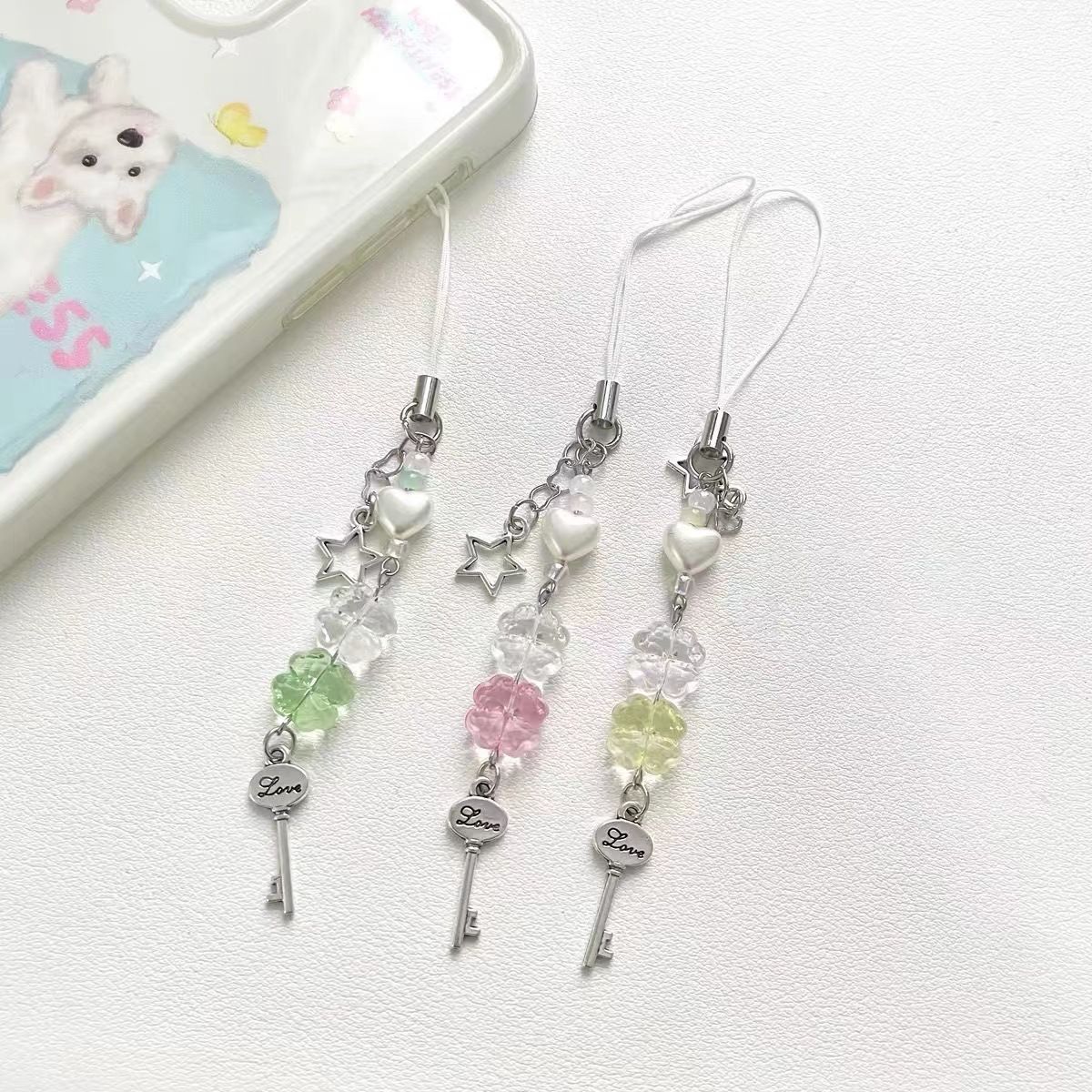 Picture of Fresh and Sweet Four-leaf Clover Mobile Phone Chain Handmade Lucky Four-leaf Clover Beads Goo Ben Chain Mobile Phone Hanging Chain Keychain Card