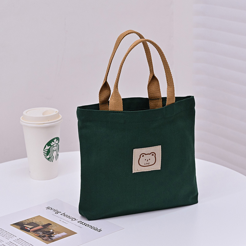 Picture of 2025 New Cute Cartoon Japanese Style Canvas Bag Tutorial Lunch Bag Manufacturer Wholesale Bag Women's Bag Handbag