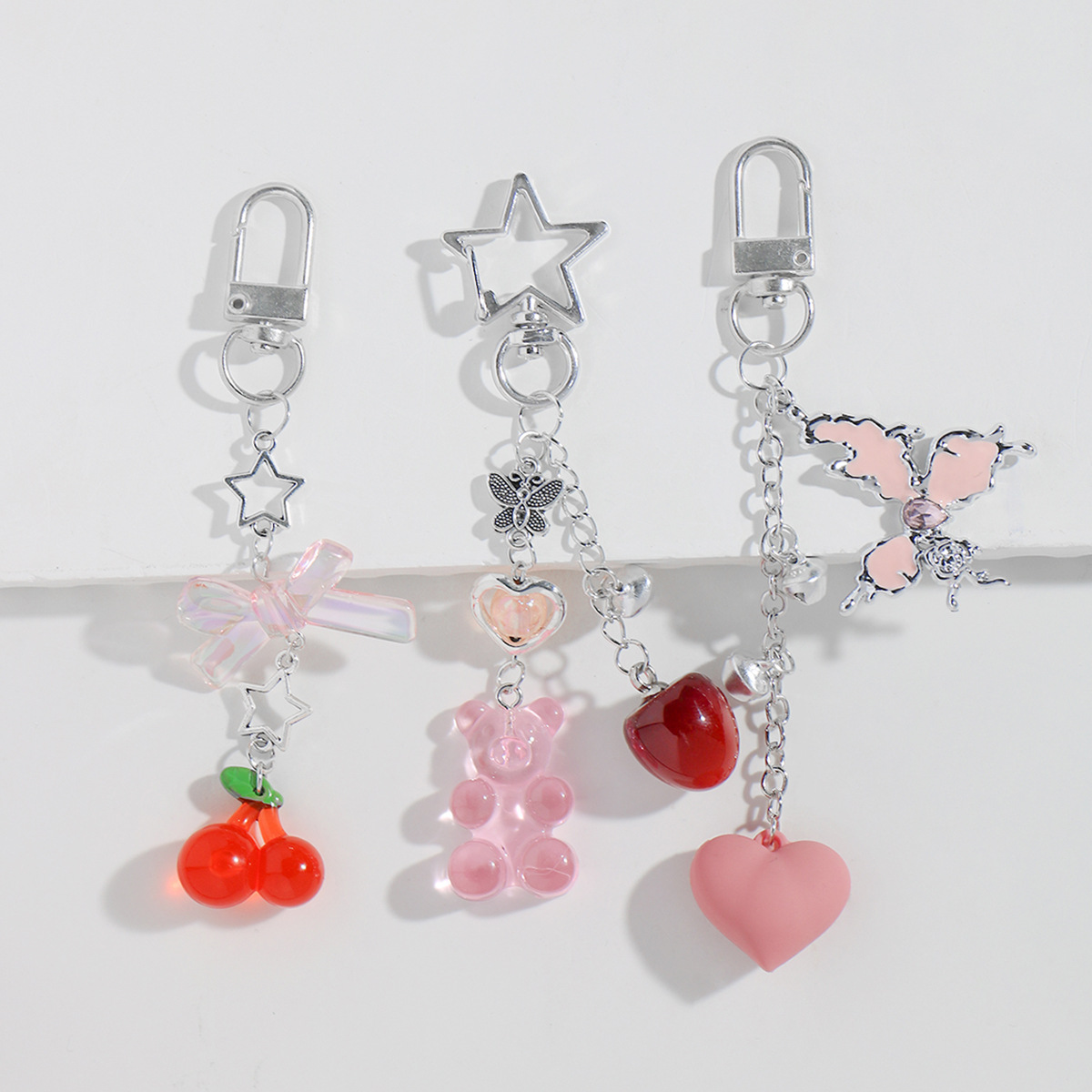 Fashion fresh and sweet hollow five-pointed star bow bear cherry butterfly acrylic keychain backpack pendant