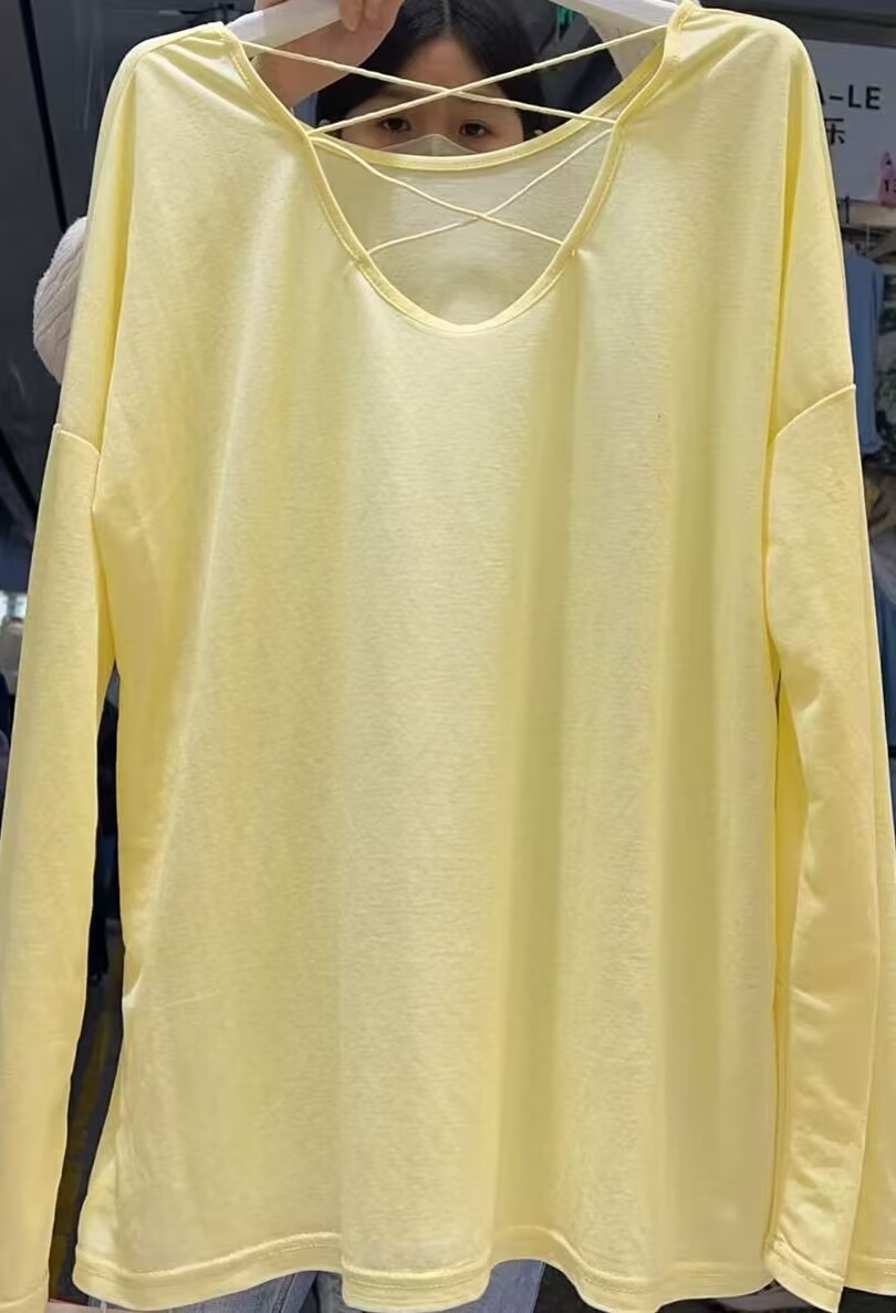 Picture of Loose Version of Thin Backless Long-Sleeved Sun Protection T-Shirt Women's Air-Conditioned Blouse Niche Design Top Summer Light