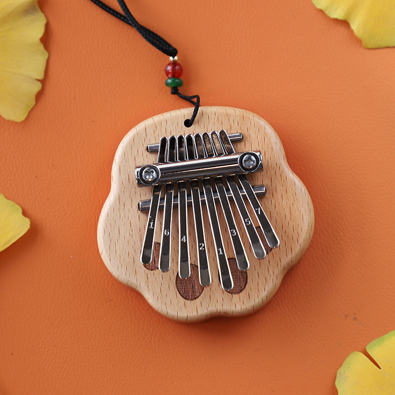 Picture of Mini Thumb 8-Tone Mini Calimba Crystal Transparent Five-Finger Portable Beginner's Finger Instrument