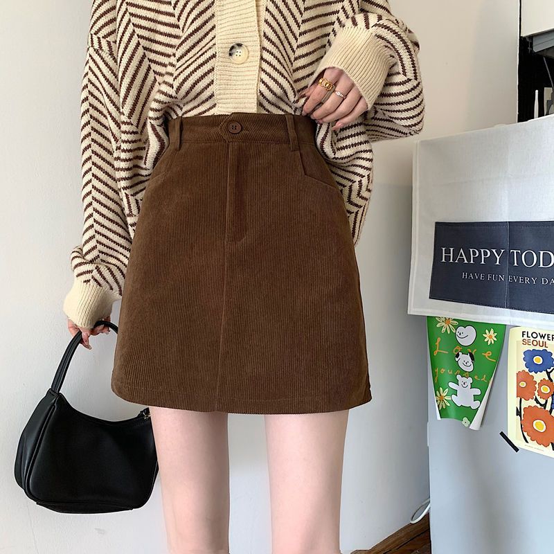 A Short Skirt Autumn and Winter Women's Corduroy Skirt New Design Sense Niche High Waist Black Hip Skirt Ins