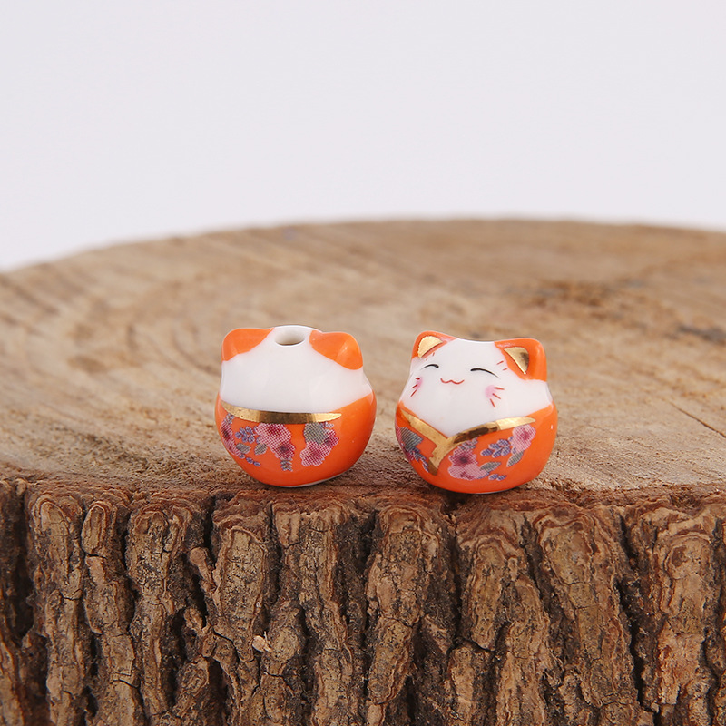 Picture of Japanese-style ceramic lucky cat beaded vertical hole cat pendant jewelry mobile phone chain ceramic cat bracelet DIY loose beads wholesale