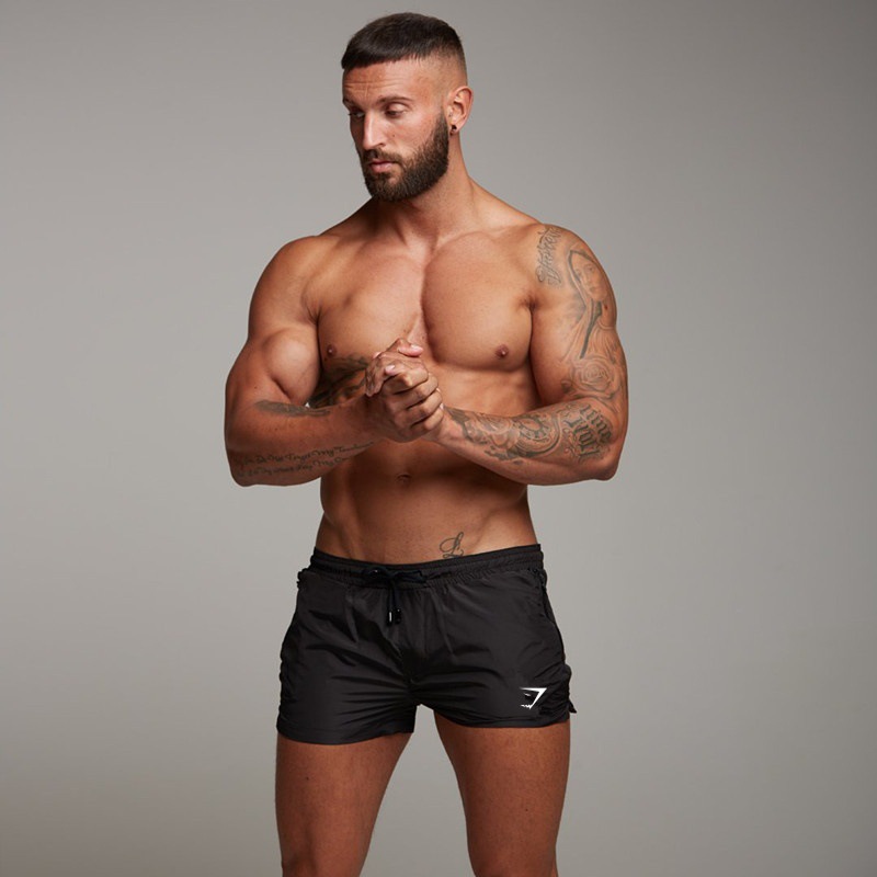 Cross-border Summer Sports Fitness Casual Shorts Muscle Fitness Three-point Pants Men's Sports Running Zipper Beach Shorts