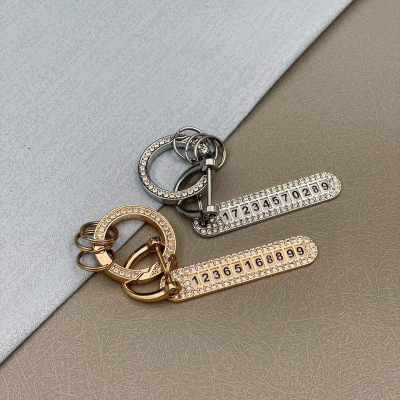 Picture of Diamond-Encrusted Creative Car Keychain with Anti-Lost Phone Number Plate Exquisite Key Chain Key Ring Jewelry Factory Wholesale