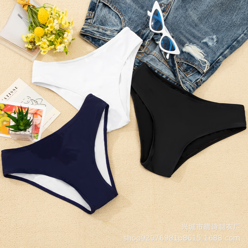 Manufacturers supply triangle swimming trunks women's solid color single lower body sexy beach bikini with lined bottoming underwear