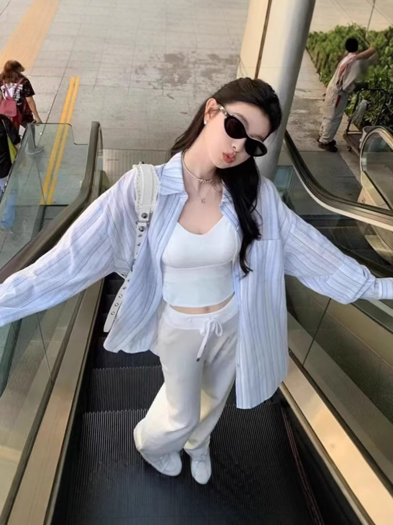 Foreign trade wholesale gentle striped shirt women's spring retro design sense niche loose slim long sleeve sunscreen shirt