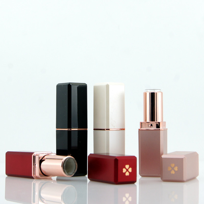 Picture of Factory in stock wholesale four-leaf clover black white lipstick tube empty tube 12.1 caliber printable logo lipstick tube