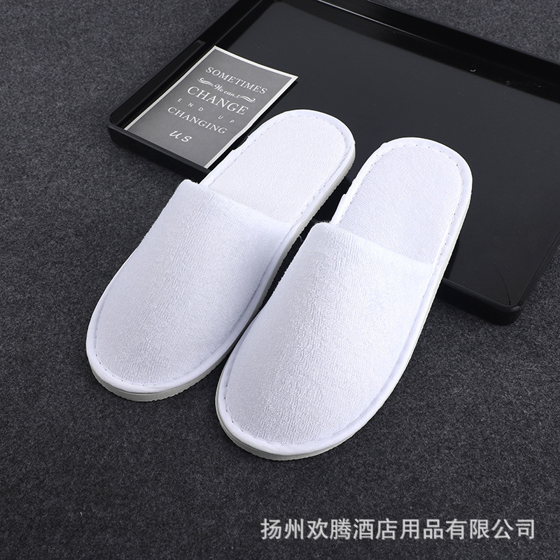 Picture of Hotel and homestay disposable waffle slippers home hospitality travel thickened slippers can be wholesale ordered LOGO