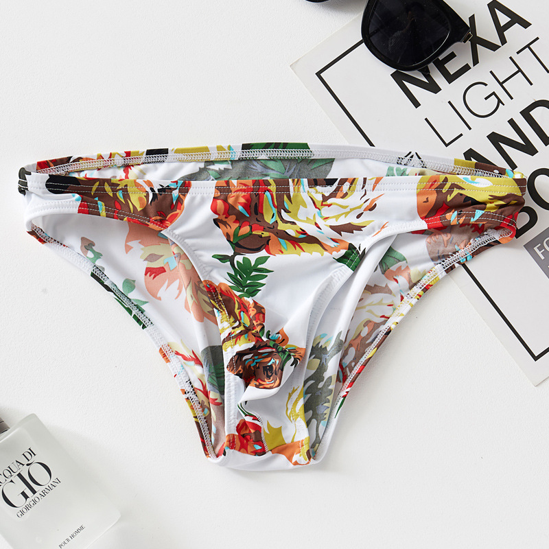 Printed breathable ice silk seamless briefs very low waist hip stretch breathable swimming trunks European and American fashion cross-border