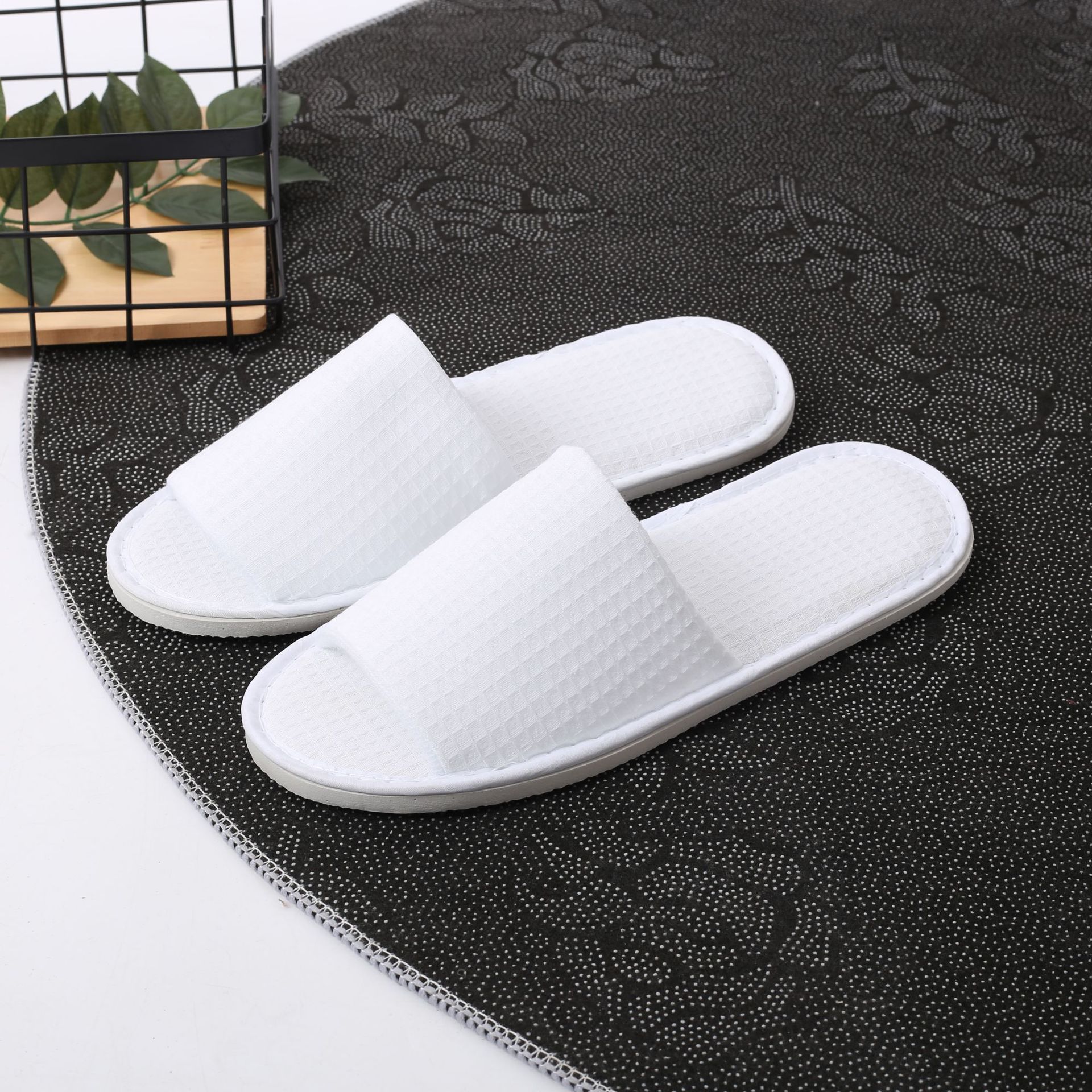 Picture of Hotel and homestay disposable waffle slippers home hospitality travel thickened slippers can be wholesale ordered LOGO
