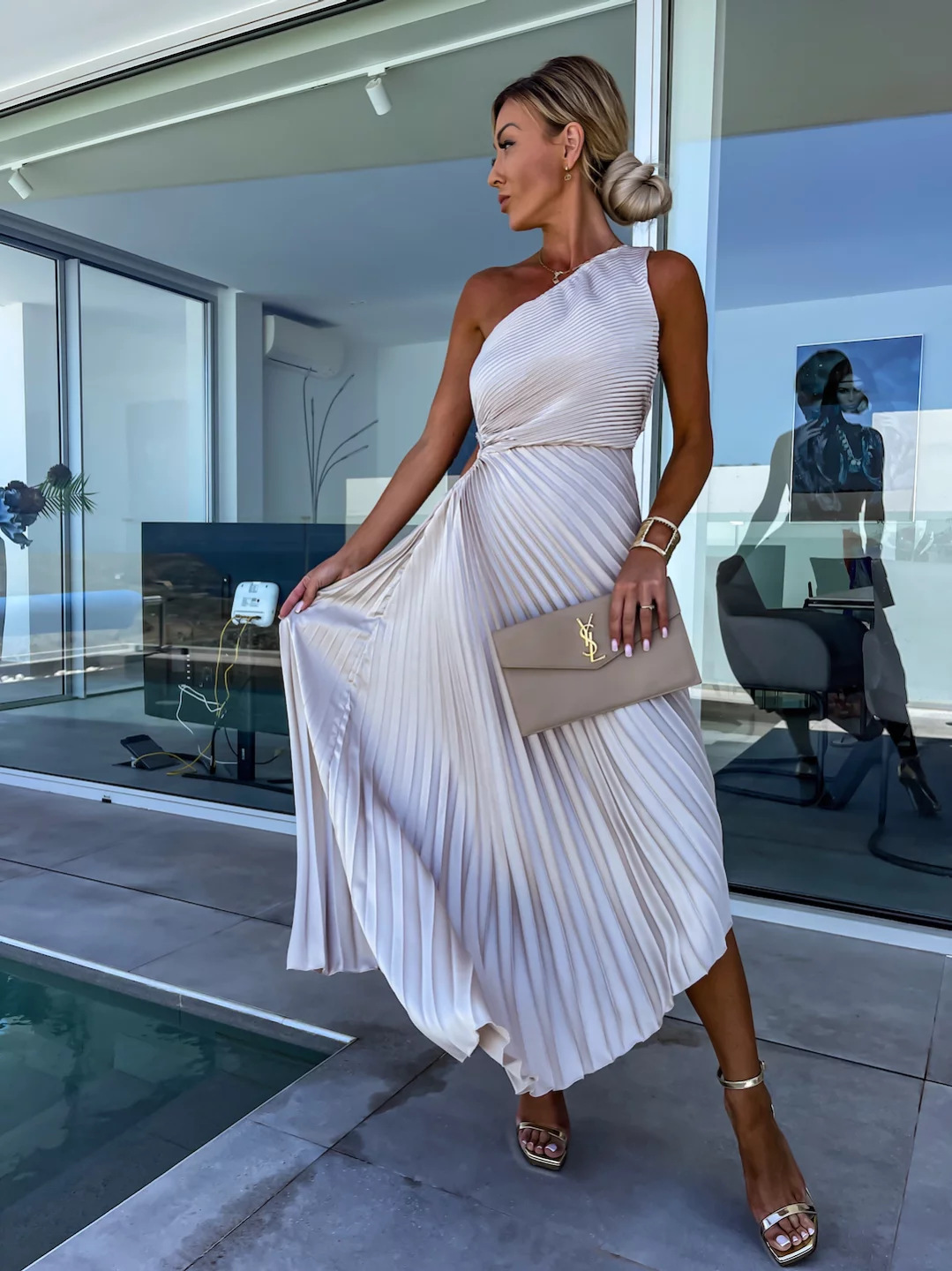 Picture of European and American 2024 Women's New Fashion Solid Color Casual Sexy Elegant One-shoulder Oblique Collar Pleated Hollow Dress