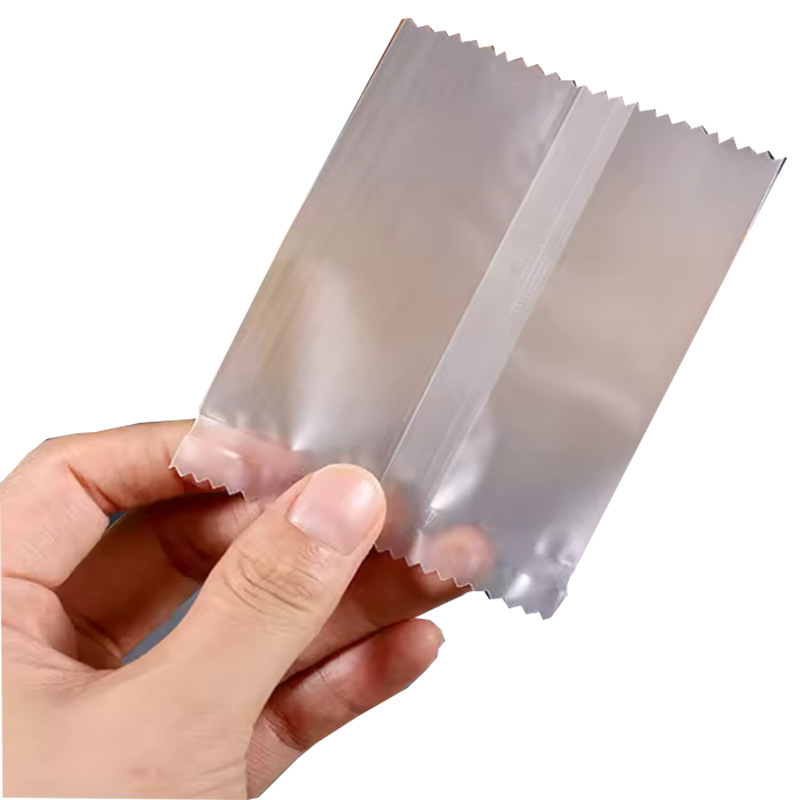 Customized Dongguan op sawtooth three side seal packaging bag printing vacuum middle seal KOPP high transparent pvdc packaging bag