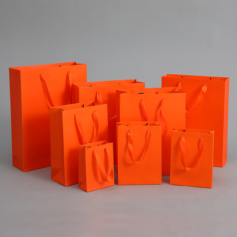 Orange handbag paper bag gift gift clothing store clothes packaging return gift hand gift hand bag shopping batch
