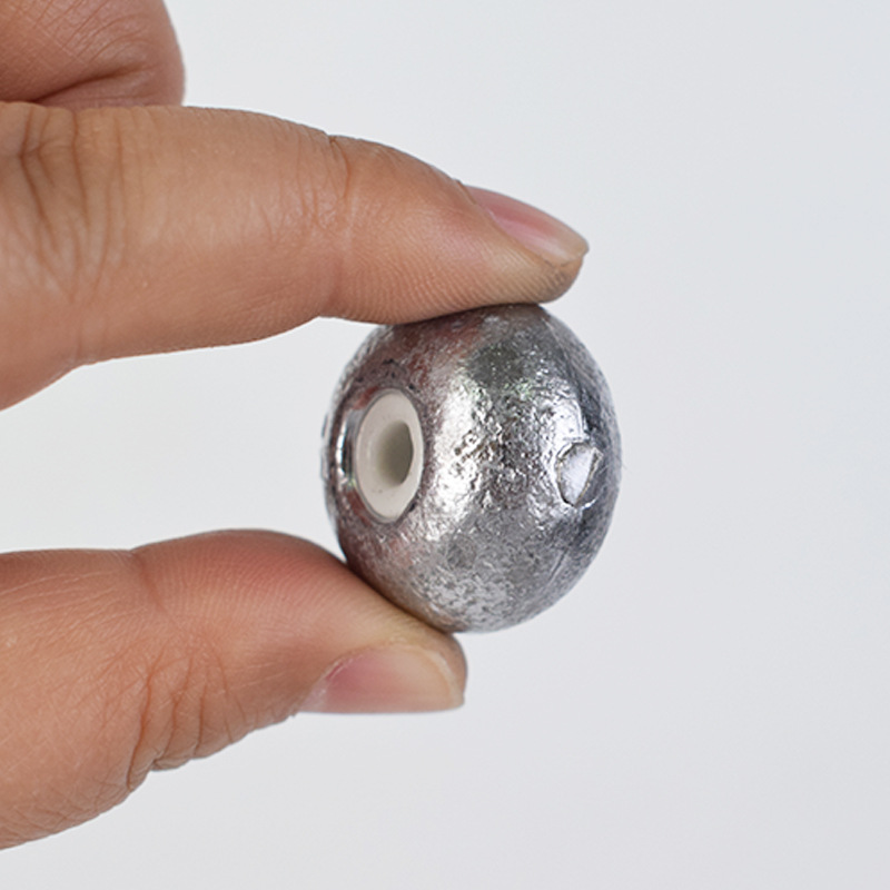 Picture of Factory wholesale fishing gear supplies ceramic abacus bead lead pendant bullet swivel lead pendant heart does not hurt the line lead pendant
