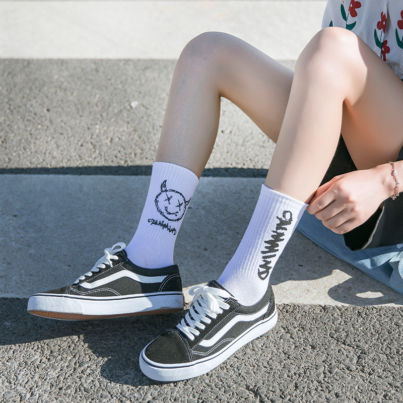 Picture of Distinctive Left and Right Foot Hip Hop Socks Women's Ins Trendy Cotton Mid-Tube Socks Women's Trendy Black and White Sports Socks Autumn