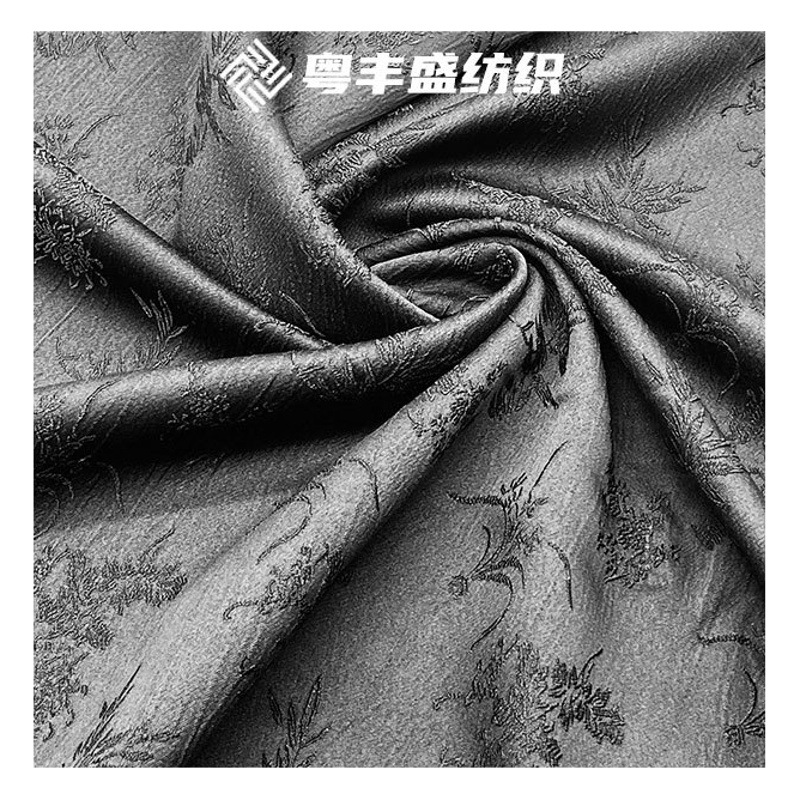 Pleated satin jacquard orchid padded embossed dark fabric plum orchid bamboo chrysanthemum new Chinese cheongsam fabric wholesale