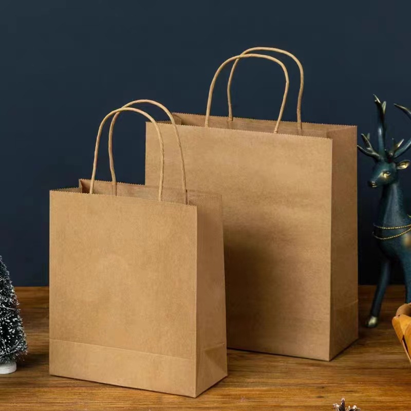 Factory multi-specification in stock kraft paper tote bag wholesale clothing paper bag takeaway tote bag printing logo